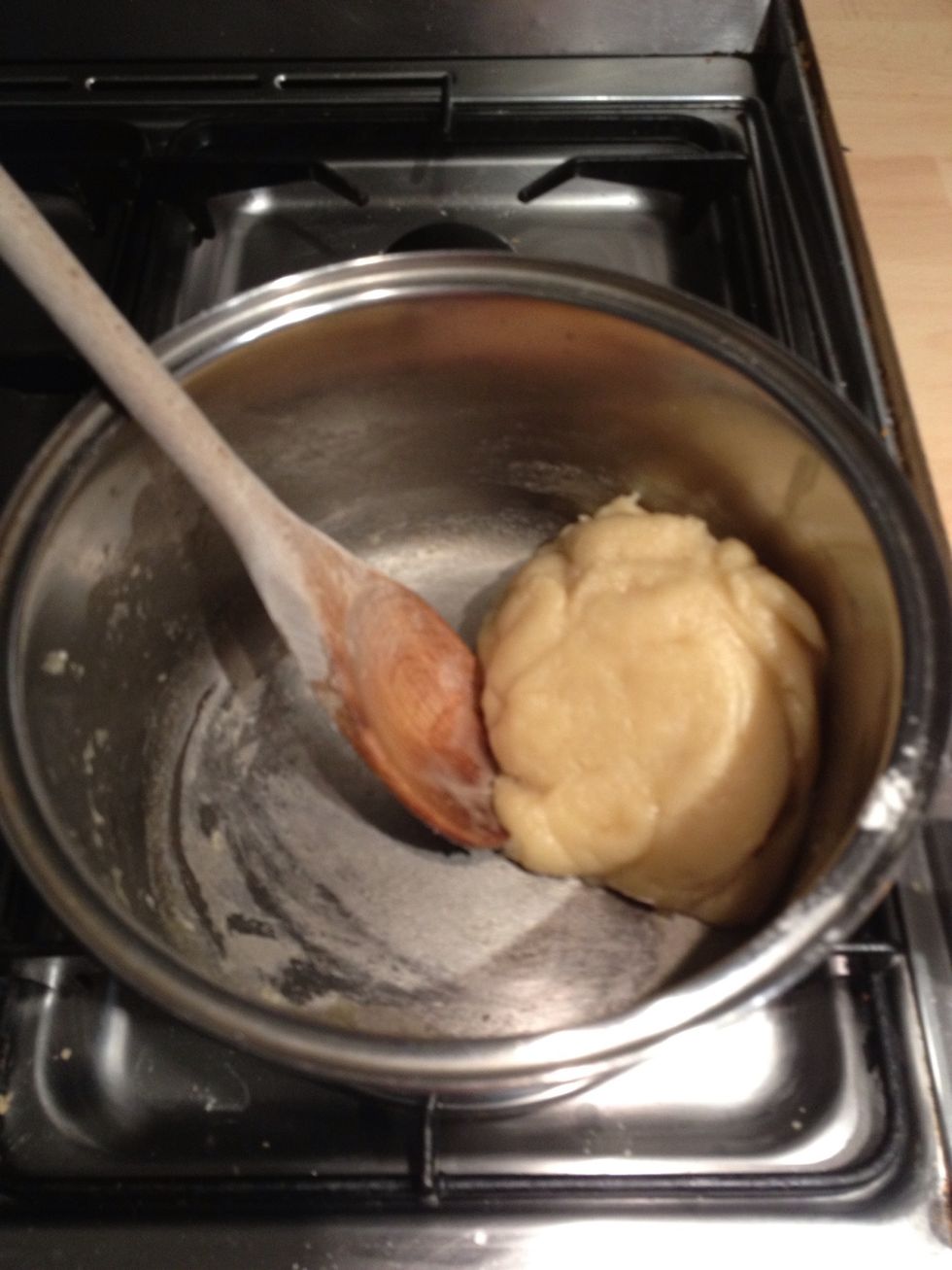 Carry on beating/stirring until it forms a ball and splits from the sides of the pan.