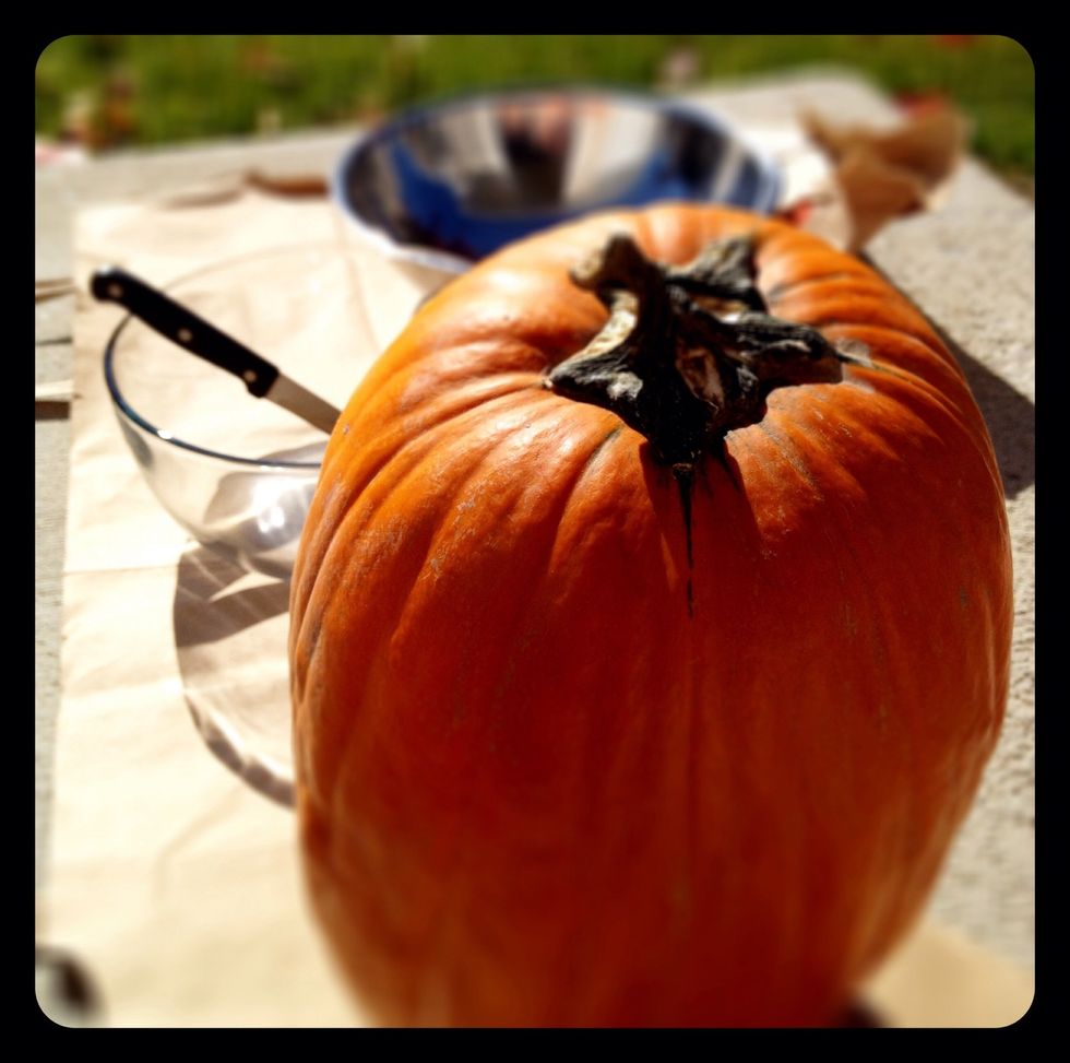 Carve and gut a pumpkin.