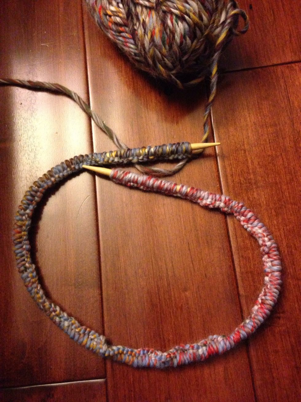 Cast on 179 stitches. Depending on how long you want the scarf. Just make sure it is an odd number of cast ons.