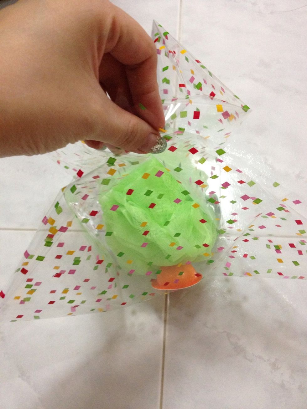 Catch the other 2end and hold. Push those other corner that sticking out