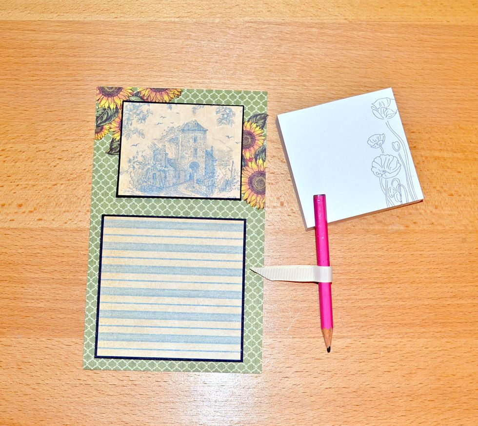 Cell 4. Make a shopping list. Take a little paper block and cut background for it. Make some decorations with flowers. I made a pencil holder from strip which folded twice and glued