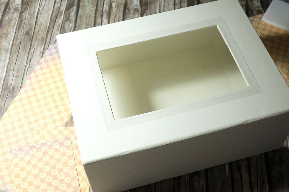 Center and glue it down to the window on the matchbook lid cover