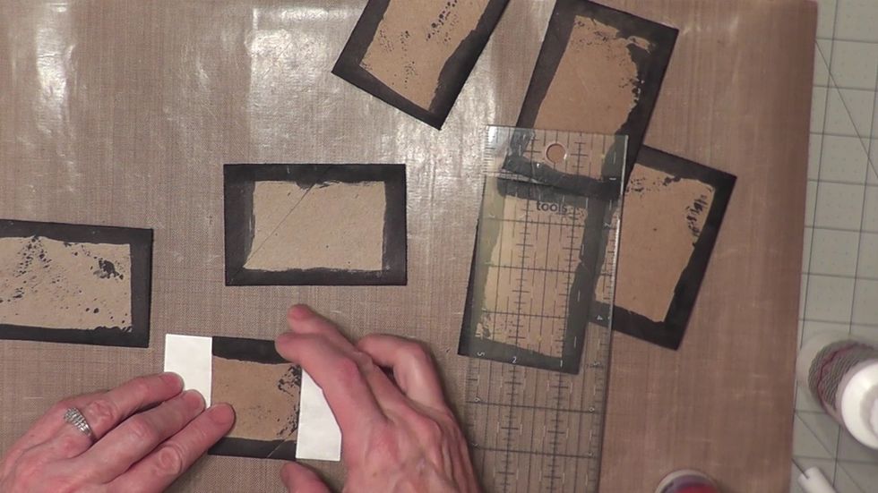 Center and glue the short tube piece onto a piece of Tyvek material. You can cut a used Priority type envelope for one piece that is the width of the tubes top to bottom and about 4 inches long.