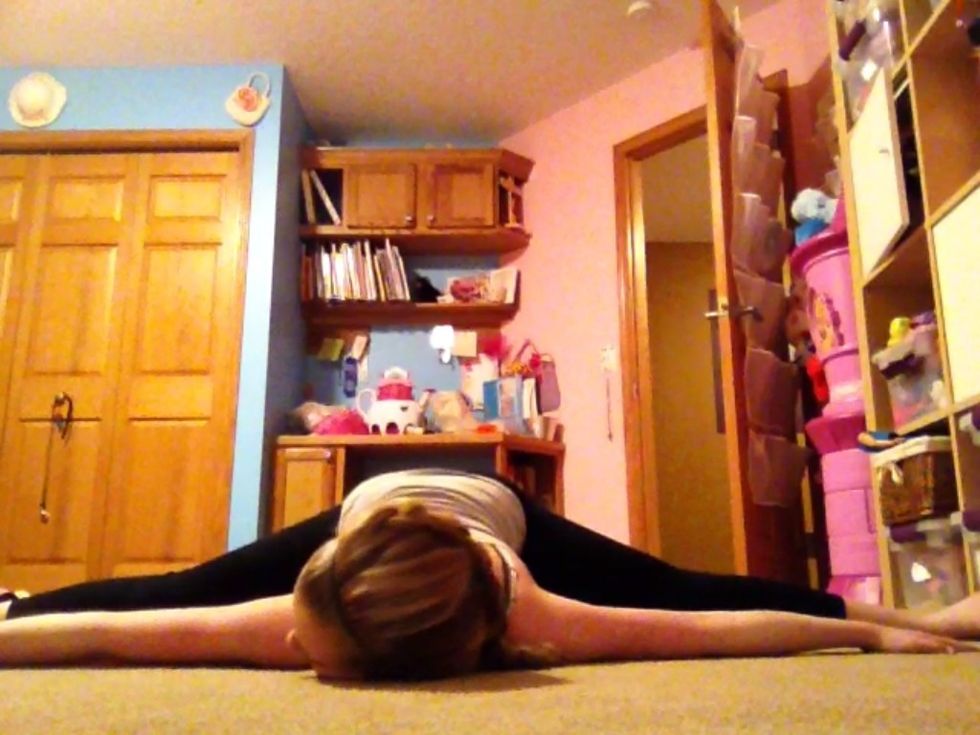 Center splits! **TIP: spread your arms out to the sides and put your chest on the floor (as shown above) to get deeper into the stretch