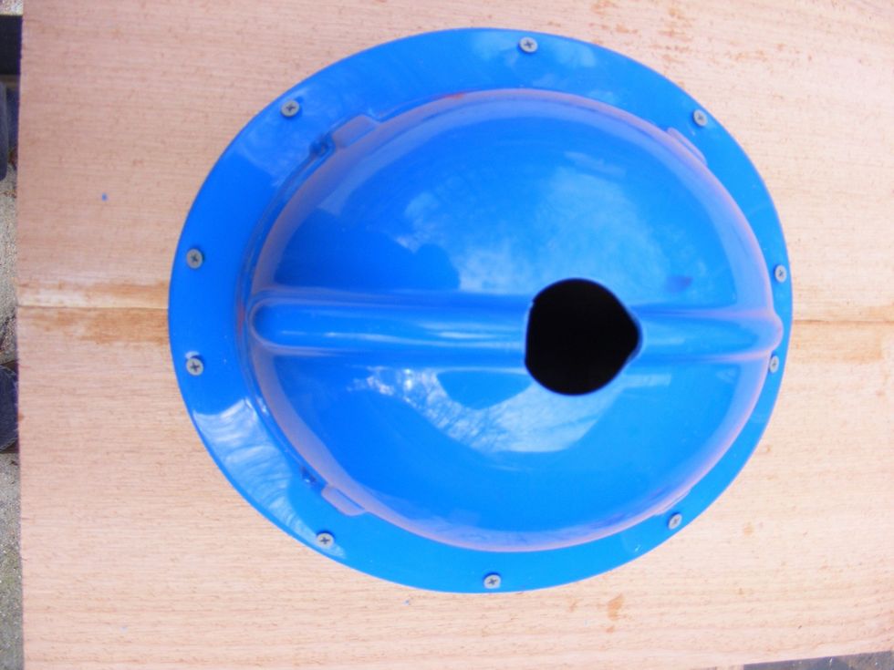 Center the hard hat up on the cedar boards. Use the 1 inch deck screws to attach the hat to the cedar boards.