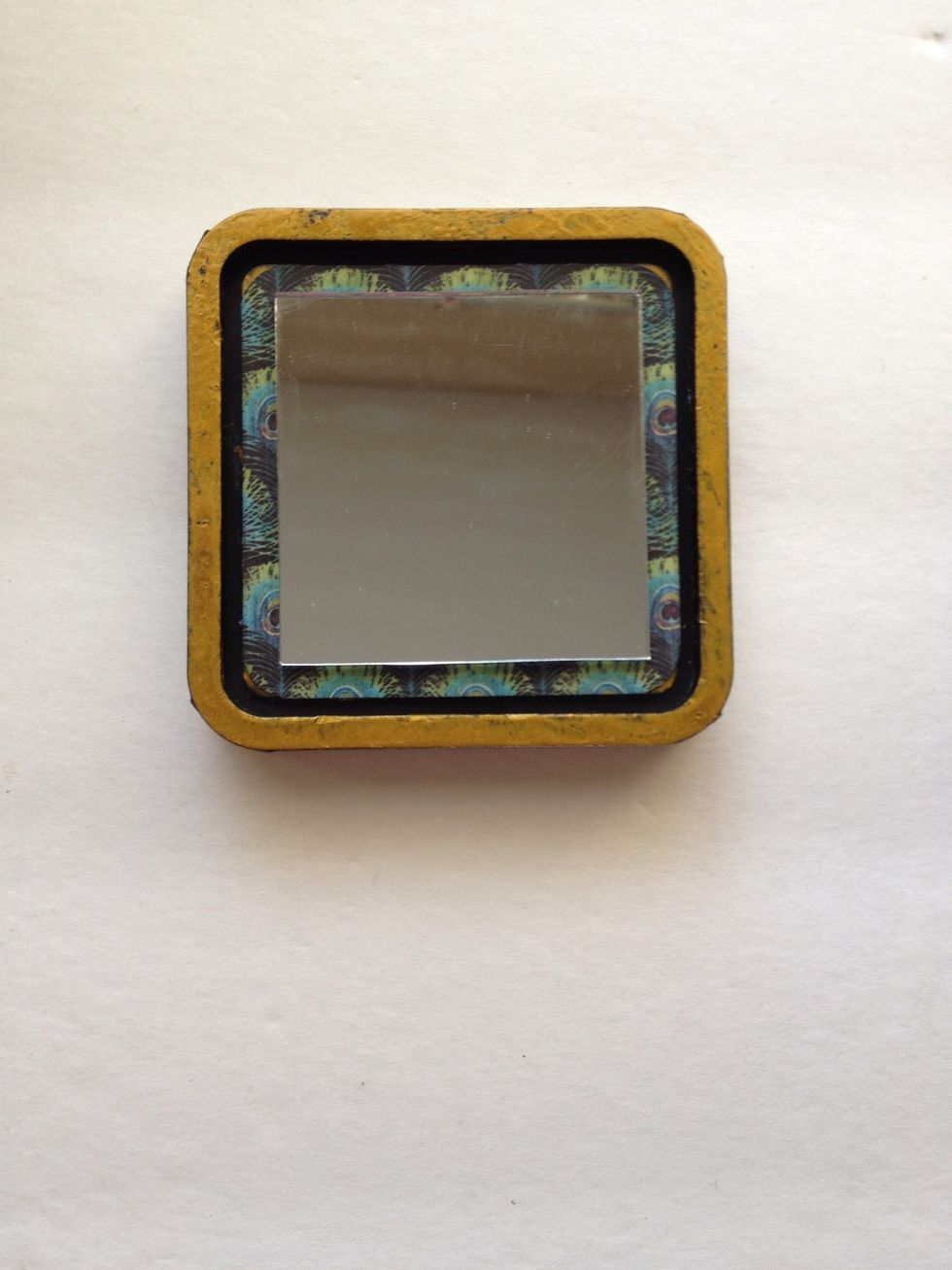 Center your mirror onto the top of the base. Adhere.