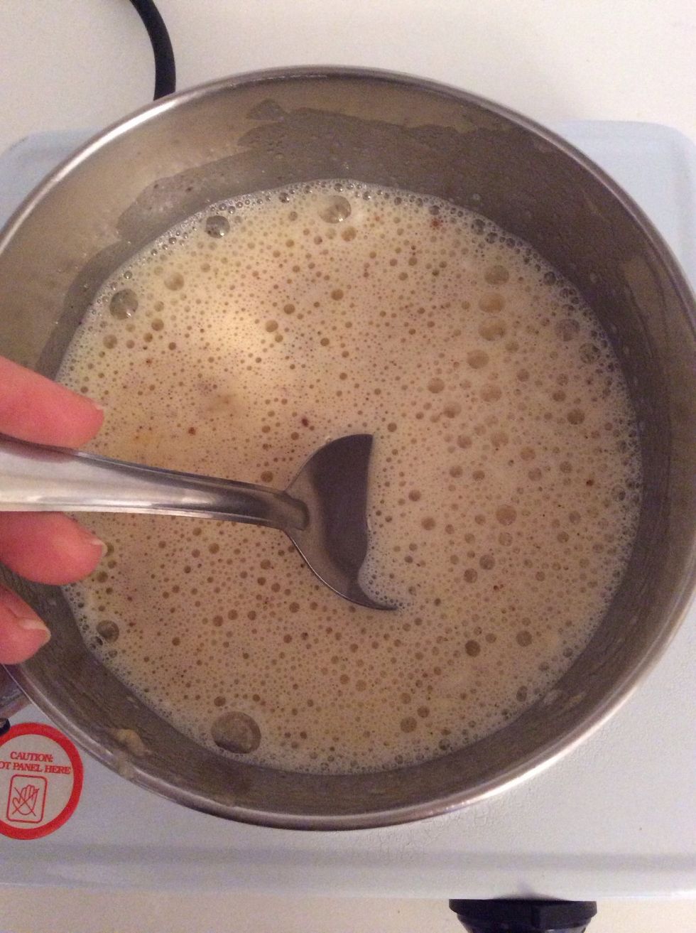 Change to a spoon and start stirring. Remember to keep an eye on it as it burns easily, especially with the milk!