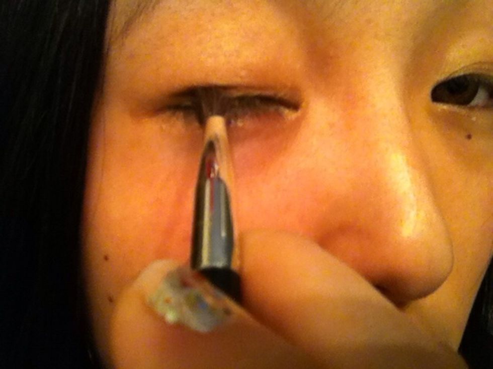 change to the smaller brush then put the khaki eyeshadow between the roots of your eyelush and the line. coner of the eyes are strongish. inner of those are slight