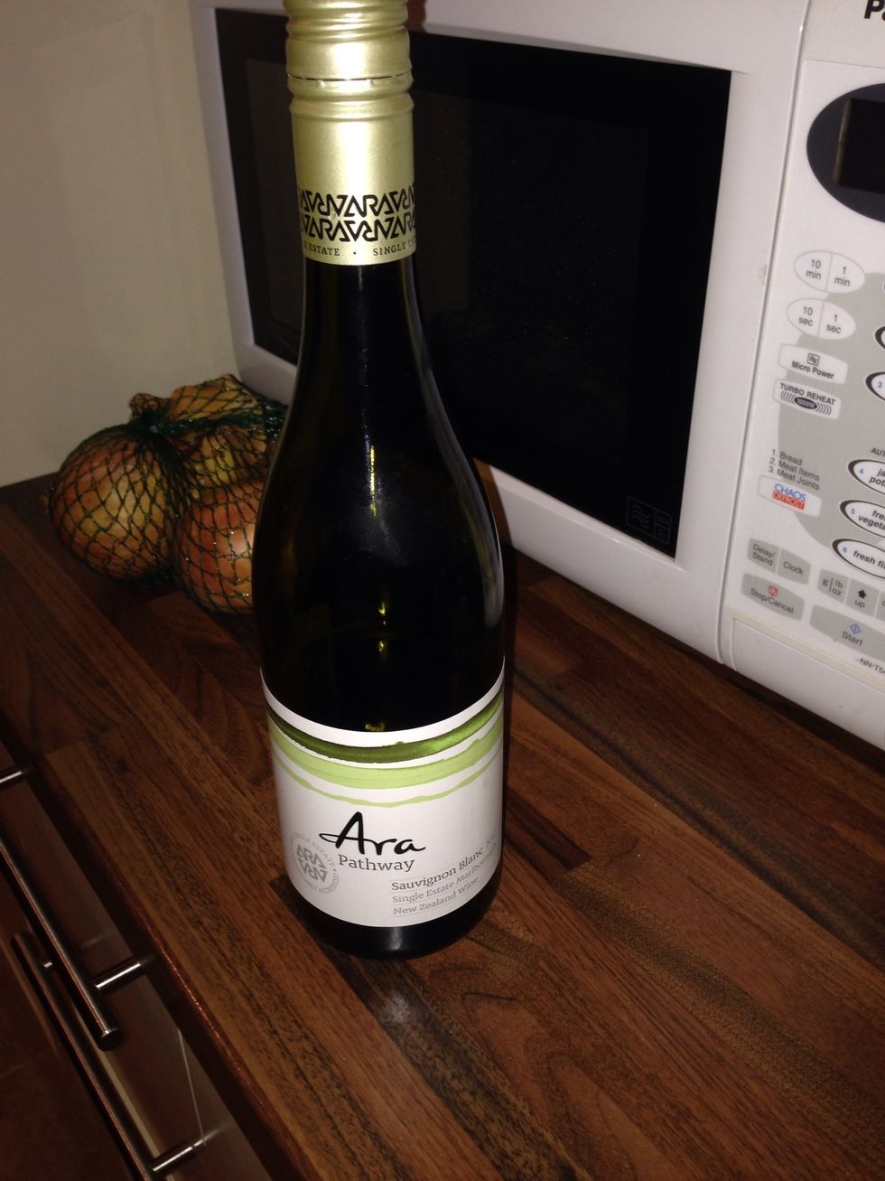 Cheap white wine (but not too cheap - you have to drink the remaining half!)