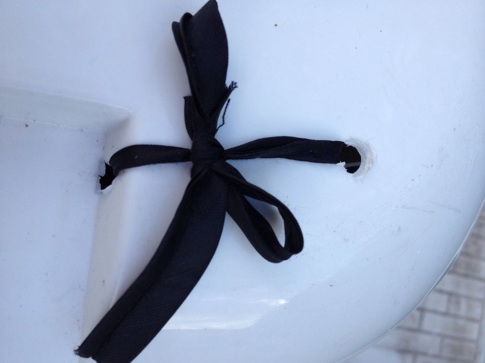 Check and neaten the holes for plastic debris. Tie through the new holes. Luckily the bed has ties on the bottom corners so I didn't have to sew strings on first! Yay time saving surprises!