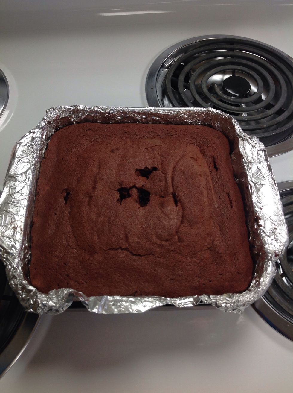 Check center to see if brownies are done.