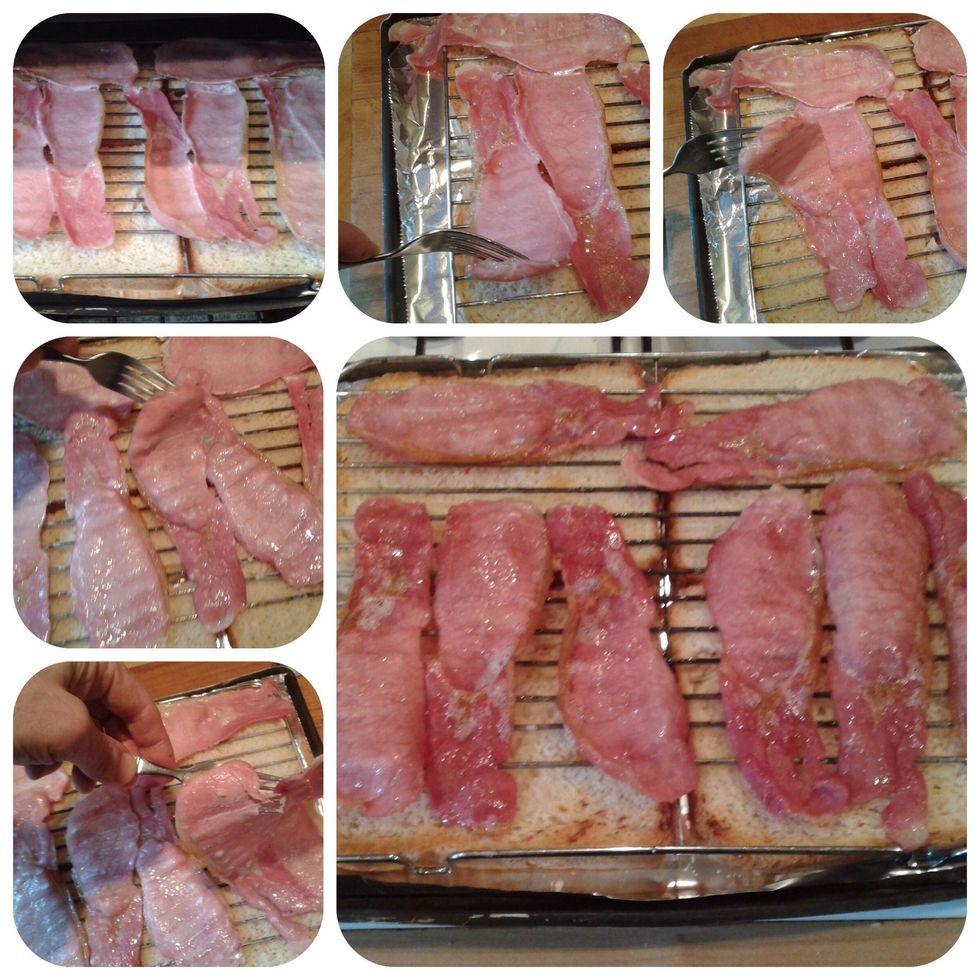 Check every 5 minutes or so and turn as necessary until the bacon is crisped and browned to your liking. The bread will warm up, go crispy and catch the tasty bacon fat so there's no need to butter.