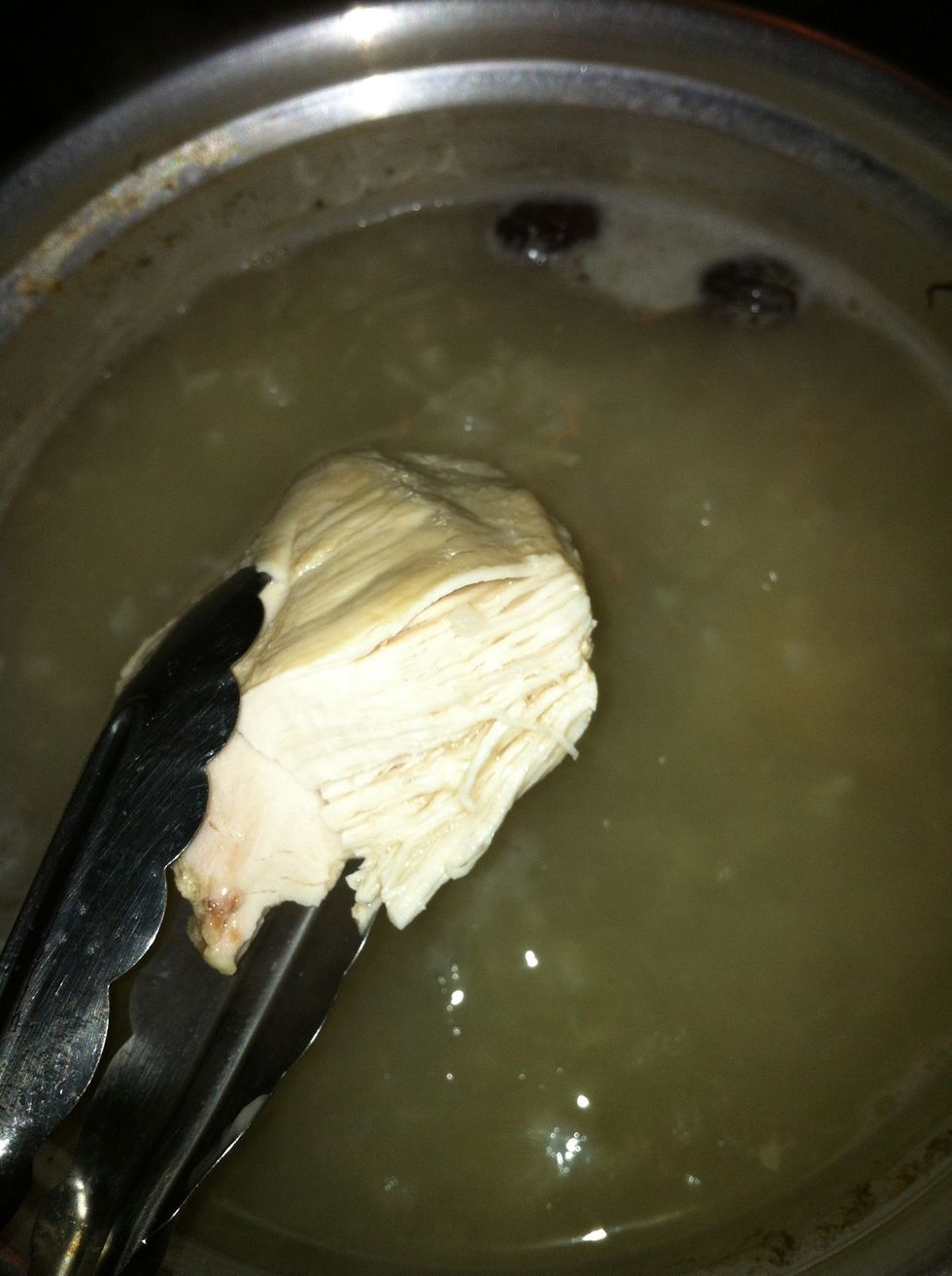 Check if the chicken meat is so soft that you can cut through it with a spoon. If you can then it's done.