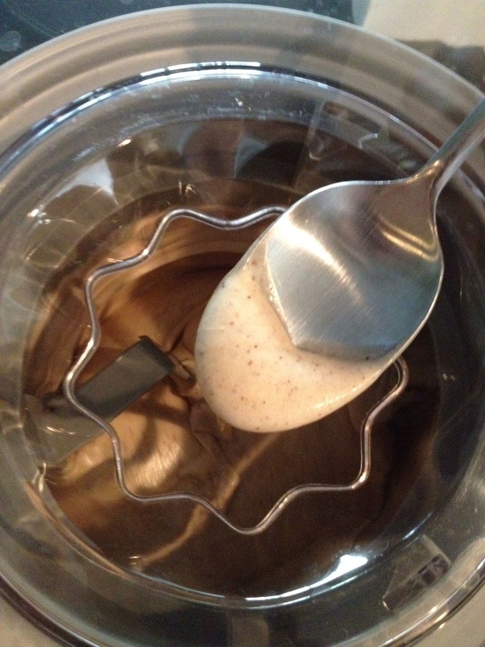 Check it as it's freezing for consistency. As it gets thicker, it's time to add any mix-ins, such as nuts, caramel, toffee bits, baked cake pieces, etc.