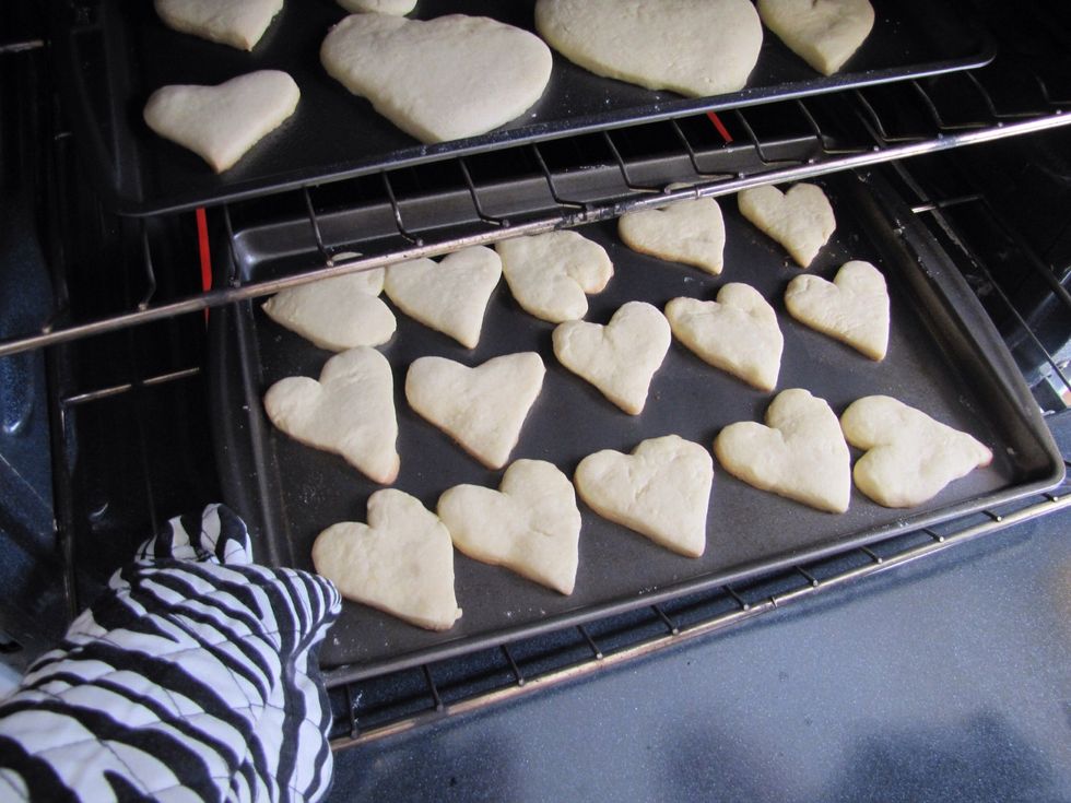 Check on the cookies in the oven to make sure they haven't burned. (Because oven temperatures vary, they may be ready before the 8 minutes is up!)