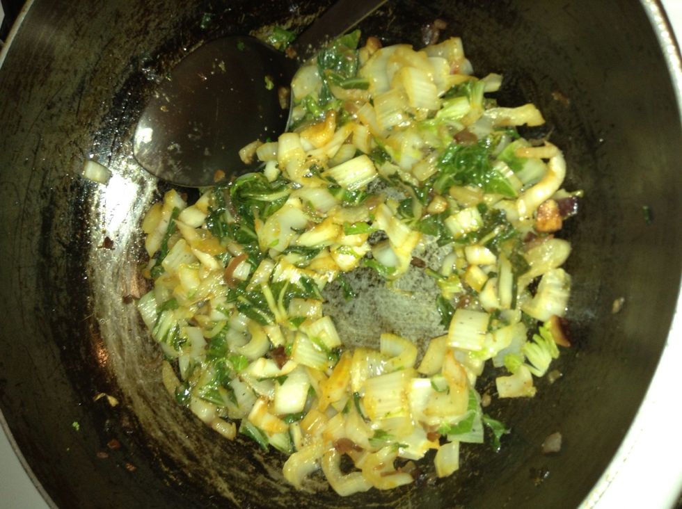 Check on your Bok choy again... Should be steaming and the stalks getting transparent . Add a little bit of black pepper and a sash of Sazon to the Bok choy