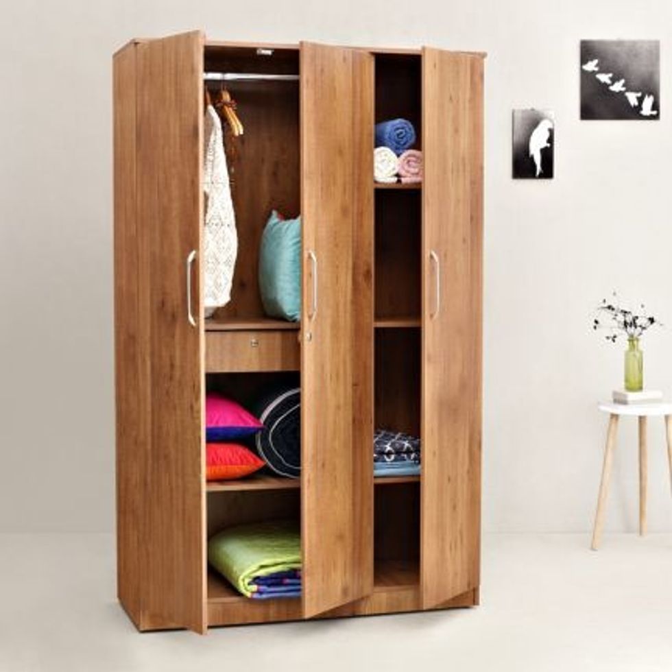 Check the construction of the wardrobe. The wardrobe can be crafted with solid wood, engineered wood, plywood or plastic. Pick the one that you think will match well with the d\u00e9cor of the room.