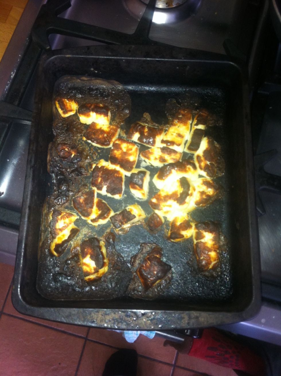 Check the halloumi after 10 minutes. Take it out if it's nice and crispy brown. Put it back in for a few minutes if you like.
