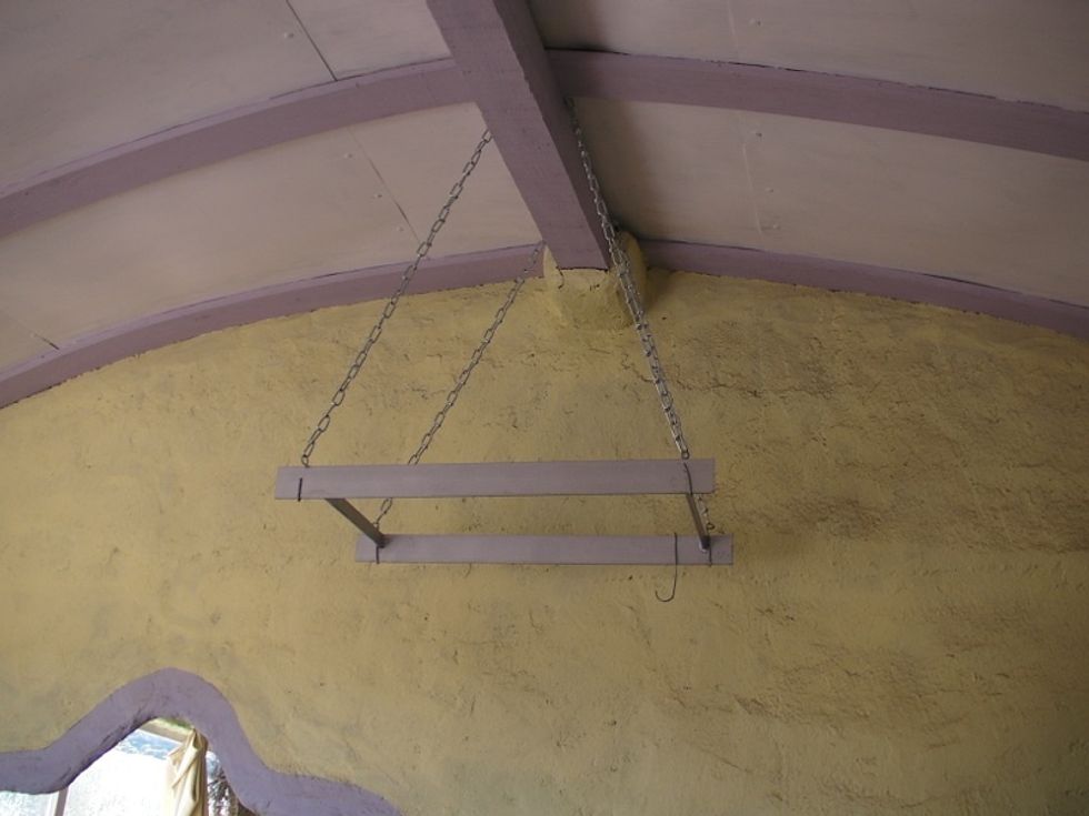 Check the pot holder is level. Hang both your biggest and shortest pan up there to make sure it's at the height you want it.