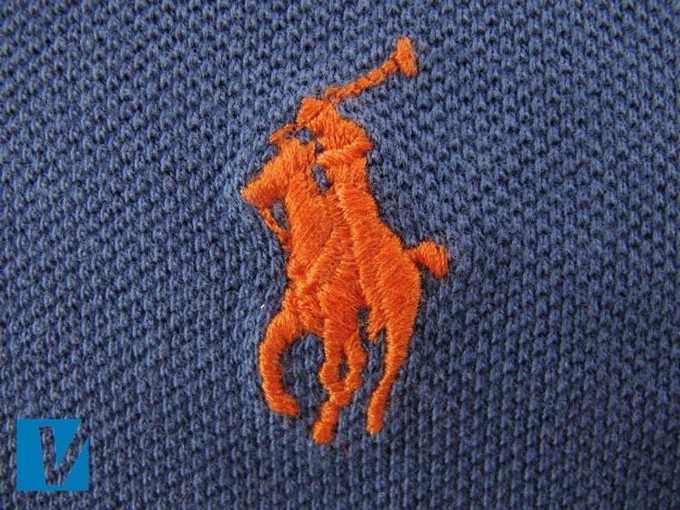 Check the Ralph Lauren Polo player logo very carefully. The rider is identifiable from the horse, and the horses reins, tail and ears are all visible.