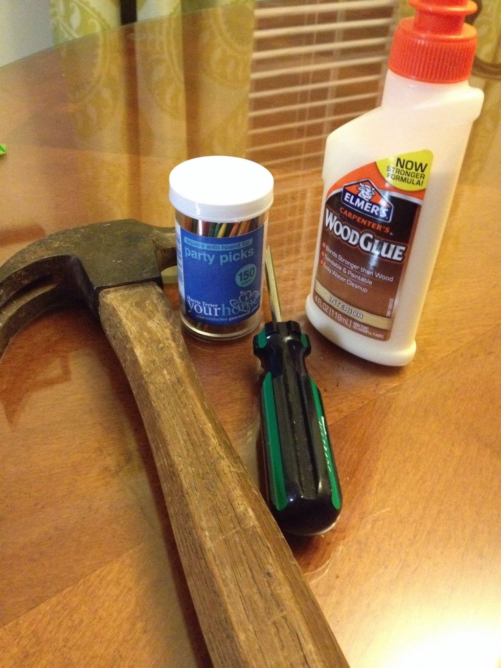 Check the screws on the cabinet to see if you will need a phillips or a flat head screw driver. If you have a lost screw, remove the remaining screw and obtain a similar one from the hardware store.