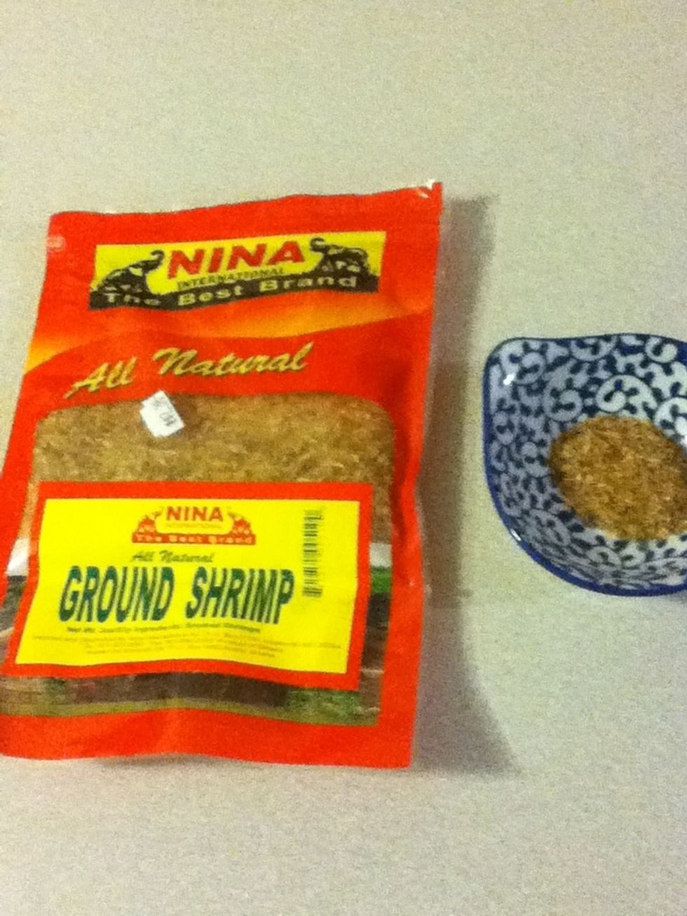 Check this out: ground dried shrimp. Find it at the Chinese store, but it might come in the form of whole shrimp. In that case, you gotta chop 'em at some point. It's very strong, so use 1/2 tbsp.