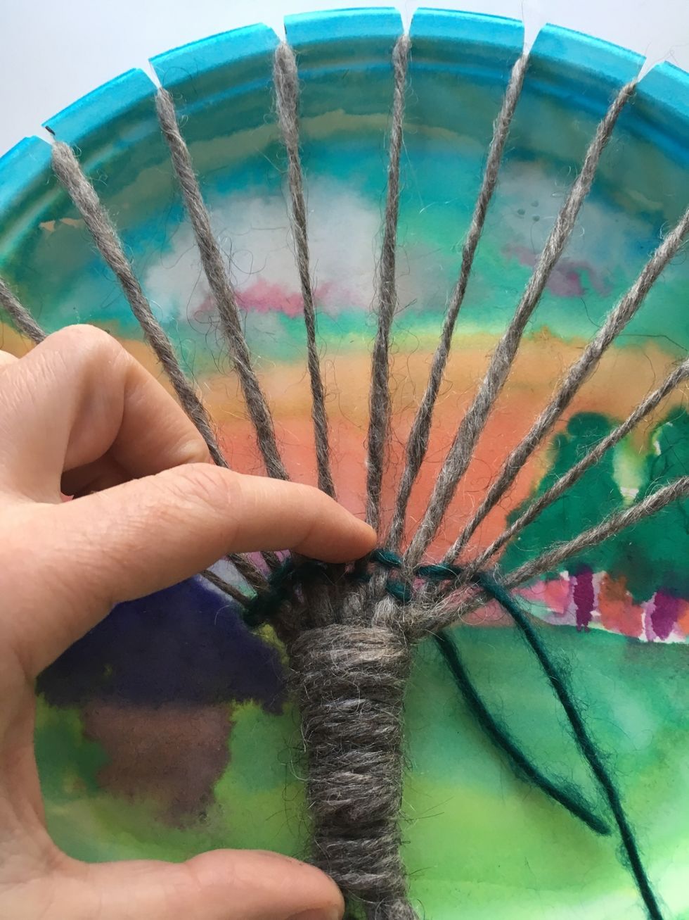 Check to make sure your weaving is correct. Your pattern will alternate and not bunch up under the same branches. Scrunch your yarn to the bottom using your fingers.