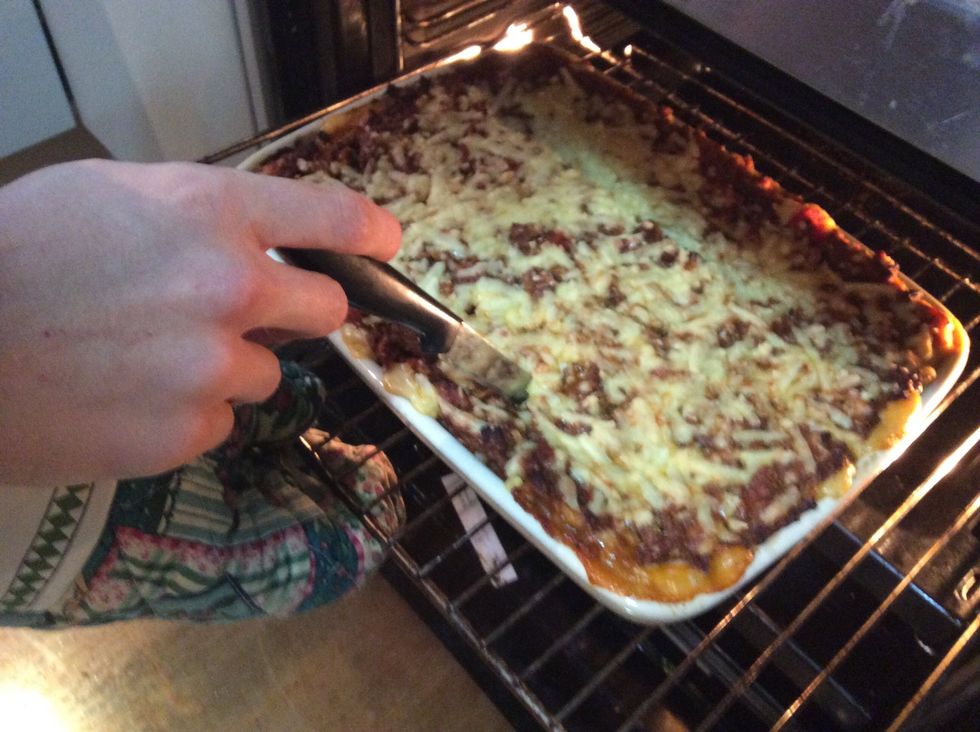 Check with knife to ensure lasagna sheets are cooked.