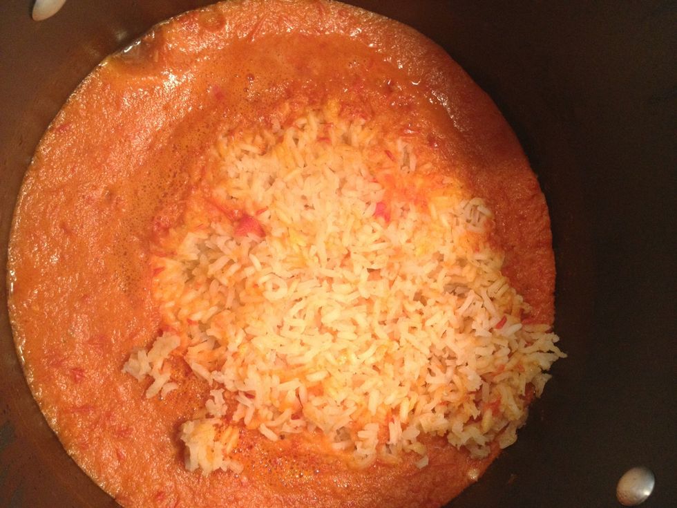 Check your rice! Need more liquid? Add more! Too much? Uncover! How do you tell, mix it a bit and have a bite. Is the rice crunchy! More water/time. No crunchy? It's done!