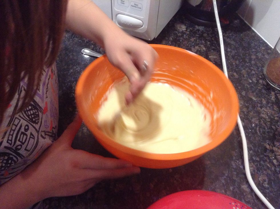 Checking if the mixture is nice and creamy. Not too thick!