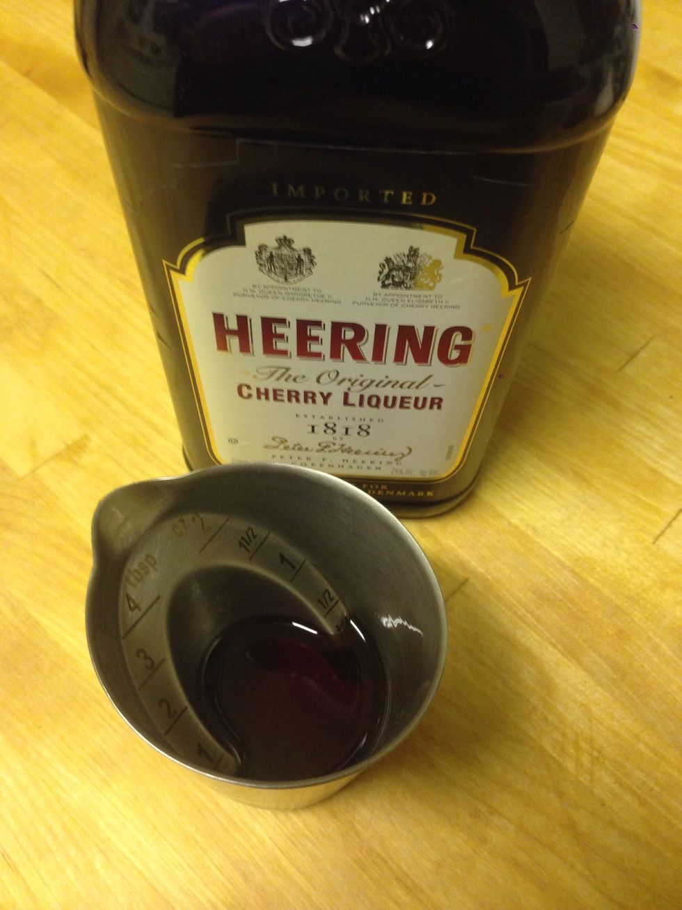Cherry Heering time (who knew this could be in a real drink) 1/4 oz. Little side note this is what separates this cocktail from a Manhattan.