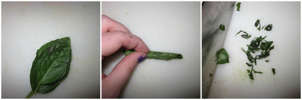 Chiffonade basil leaves into thin strips