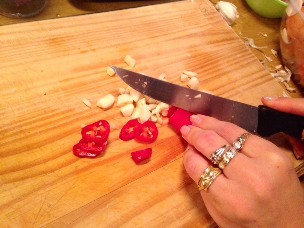 Chili can add tremendous flavour and not be too hot if you remove the seeds. Chili is however not often added with stews or oxtail