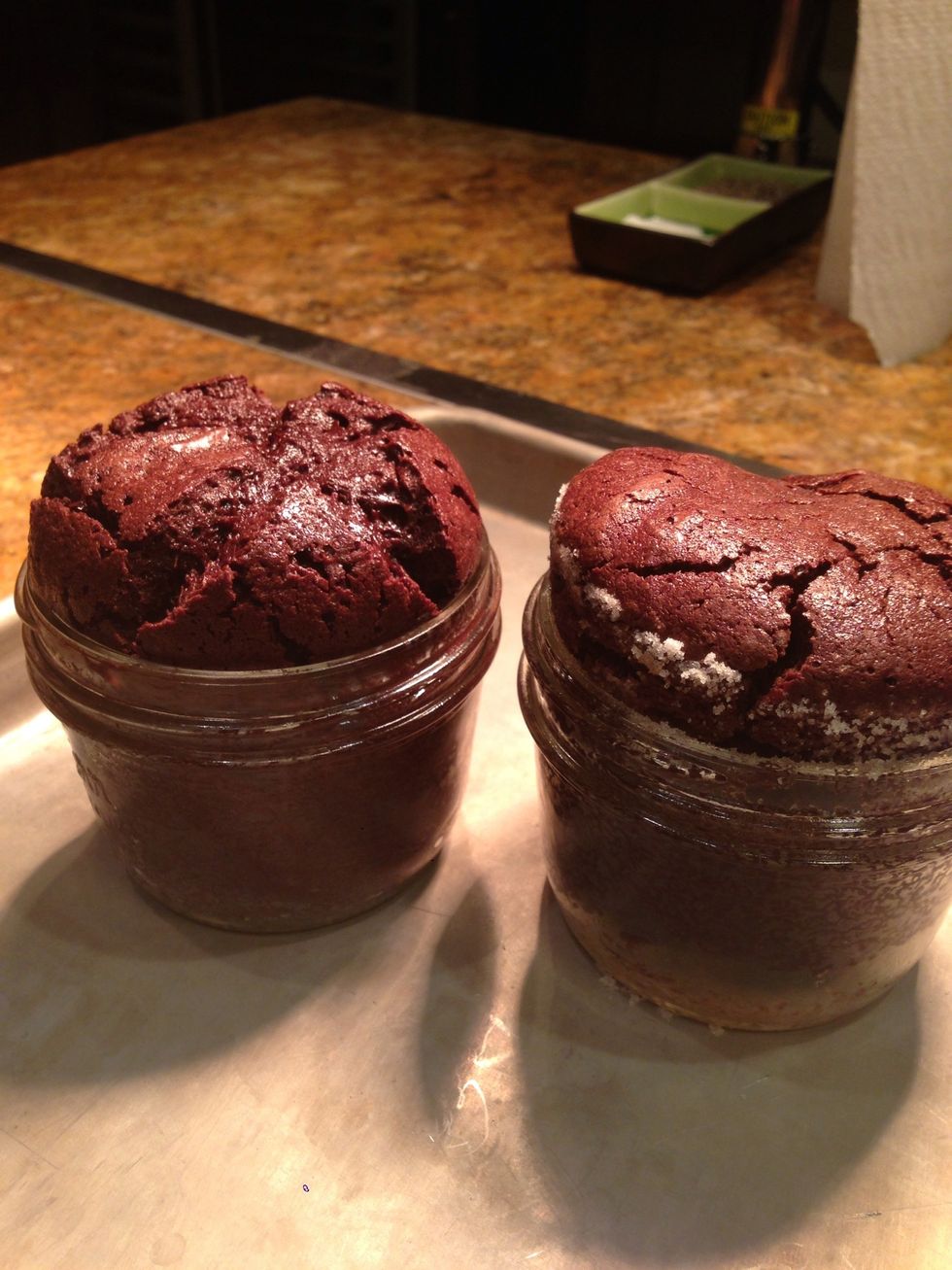 Chocolate cakes will rise and puff slightly above the jar mouth.