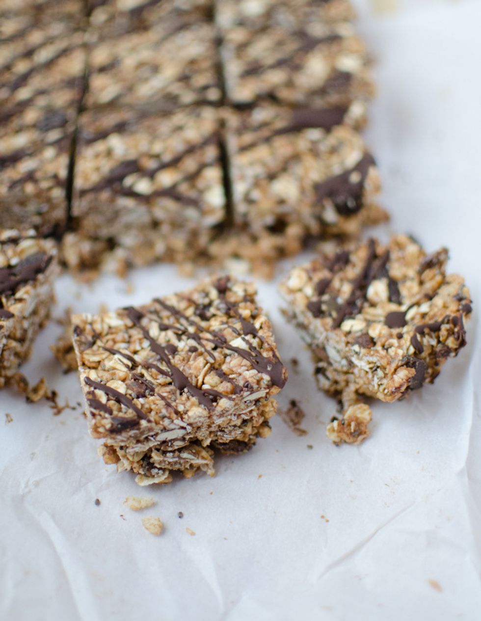 Chocolate Granola Bars: Rice Krispy treats are usually a guilty pleasure but this recipe is filled with oats, nuts + seeds, making it a healthy, vegan, gluten-free alternative. http://bit.ly/1HqR5cZ