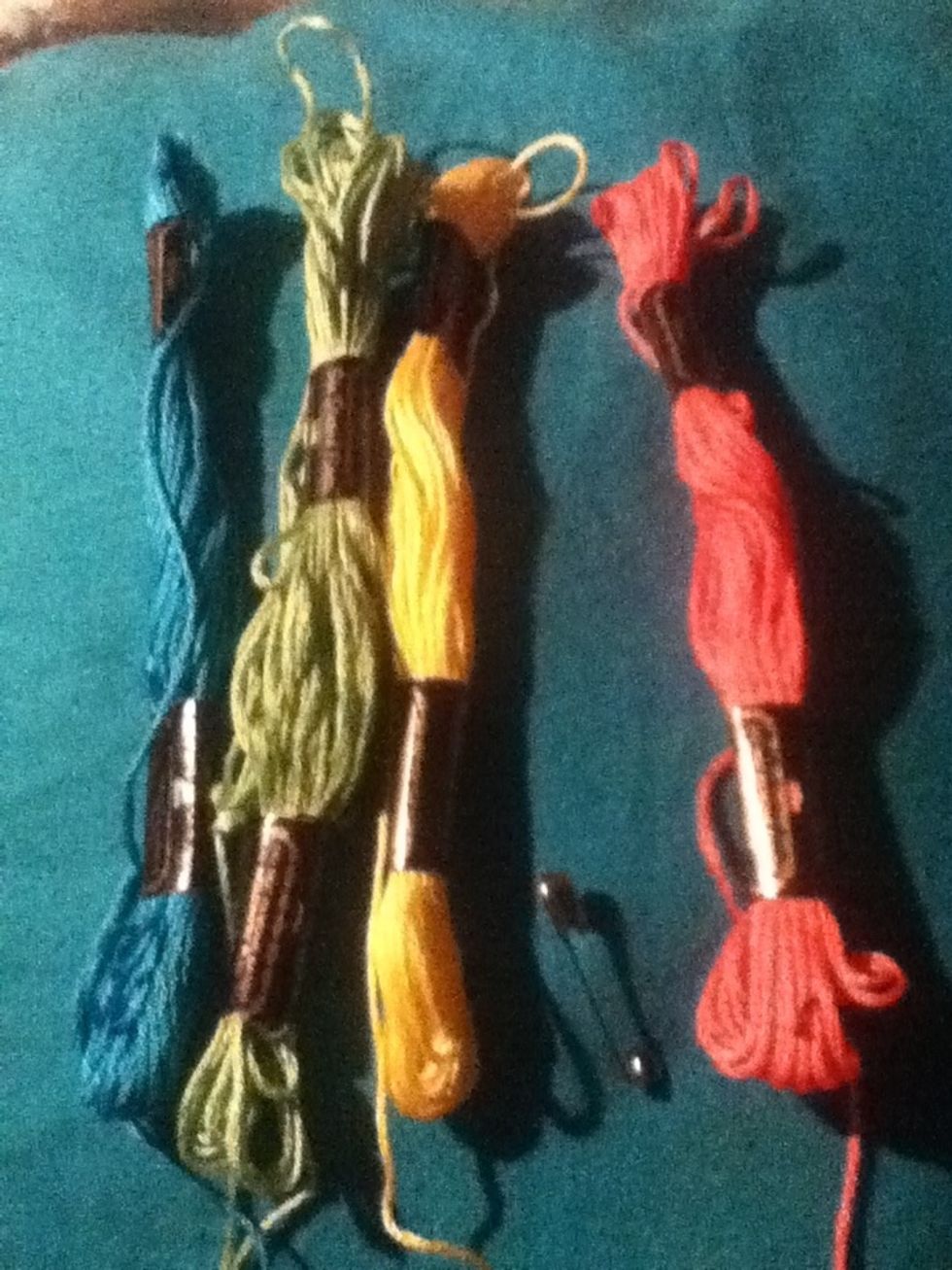 Choose 4 different colors of embroidery thread I picked blue green yellow and pink