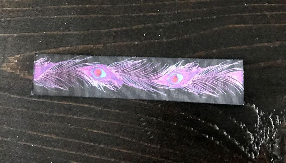 Choose a border from the Rainbow of Color paper. Cut border down to 3 3/4". Distress edges. Ink edges of border with black ink.