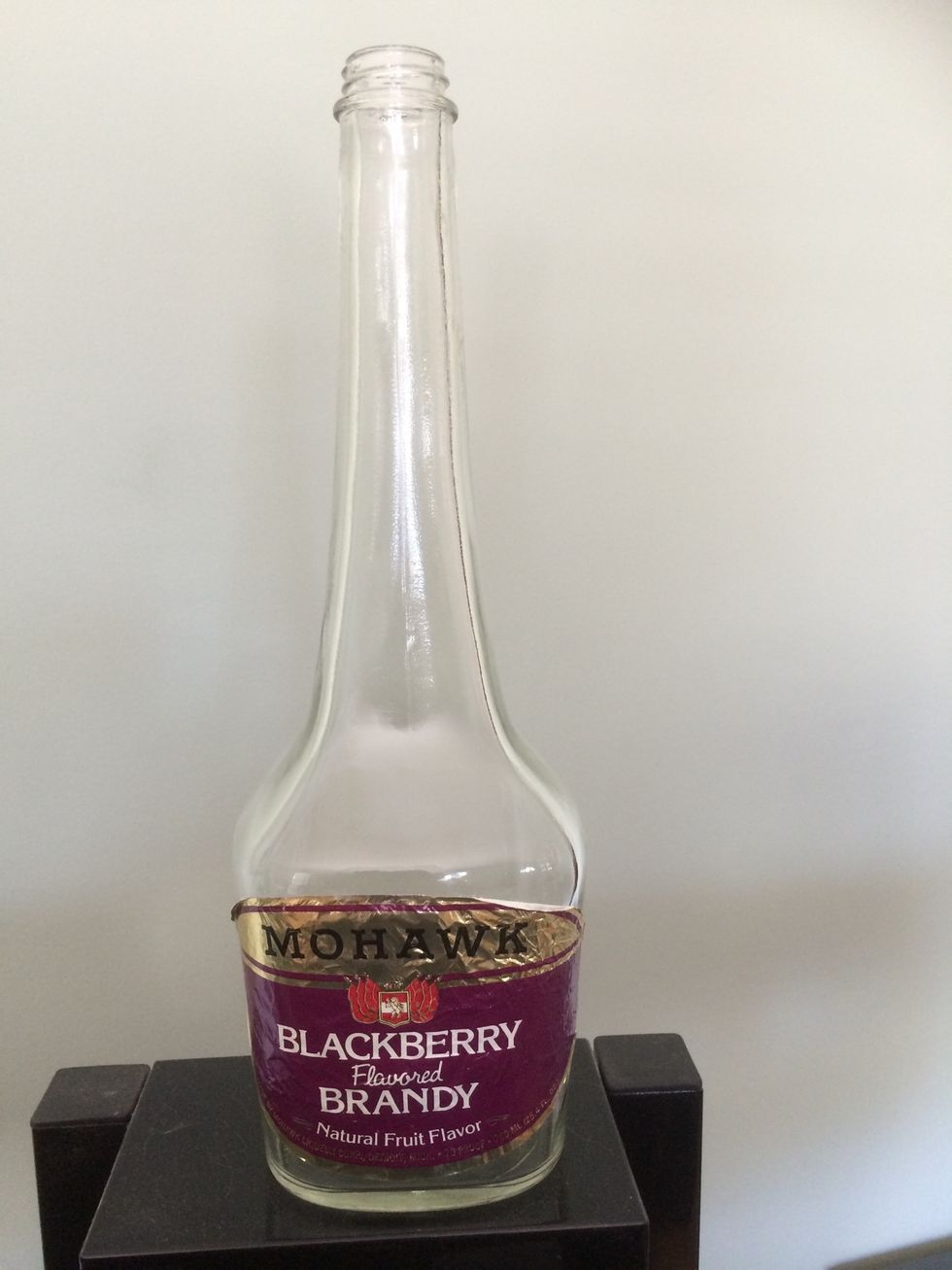 Choose a bottle, preferably a bottle with some shape or style.