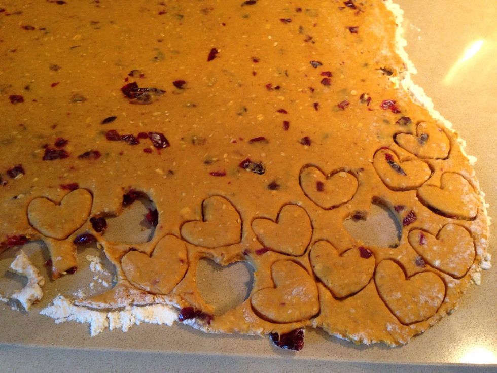 Choose a cookie cutter and get to work! I used a small cutter, so my dough made over 200 treats! Use whatever size cutter you'd like!