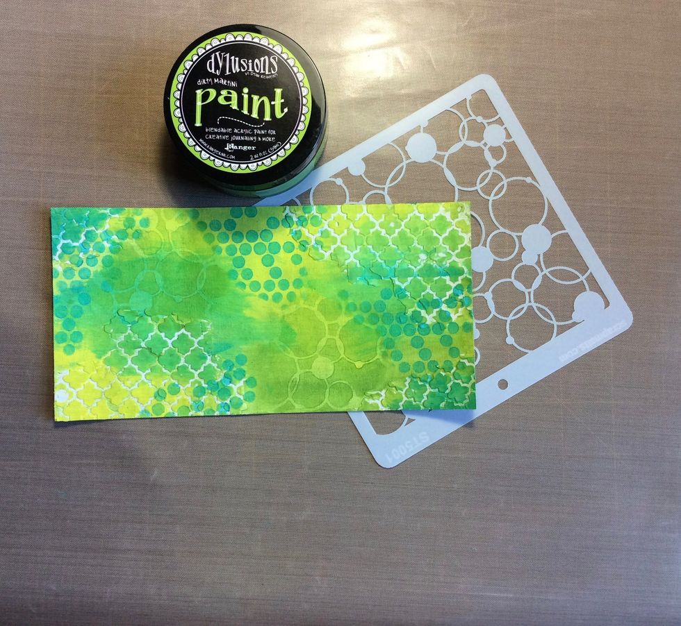 Choose a different colour from the 3 background colours and stencil on to your background with different scrapmatts stencil. I used stencil ST5001.