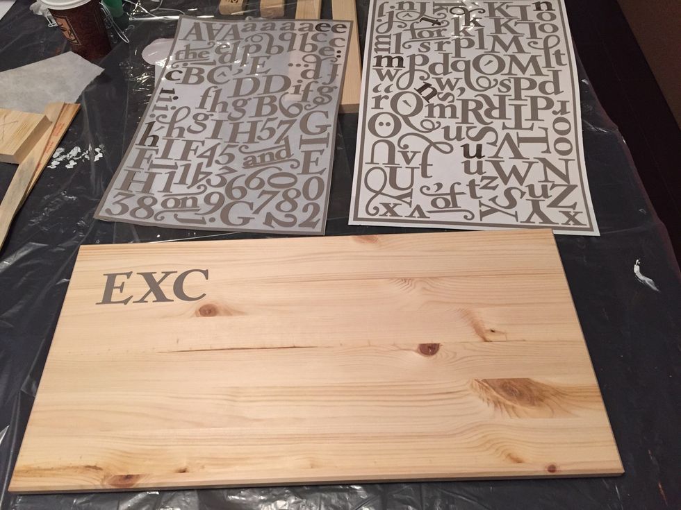 Choose a great quote and "write" it on the wood surface with sticky vinyl letters.