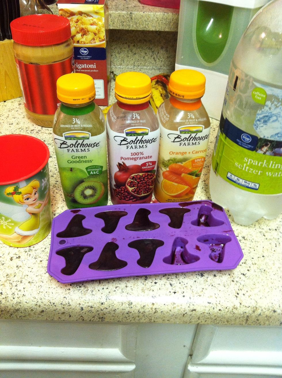 Choose a juice. I buy bolthouse juice in bulk when it's on sale. True fruit juices won't freeze completely. That's okay though. Pour it into your super cute ice cube tray. Freeze 6 hours or overnight.