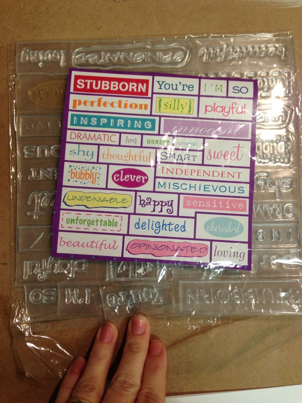 Choose a message to stamp on the front of the card. You can use loose fonts and create your own message, or in this case I chose "You're So Beautiful" from these stamps.