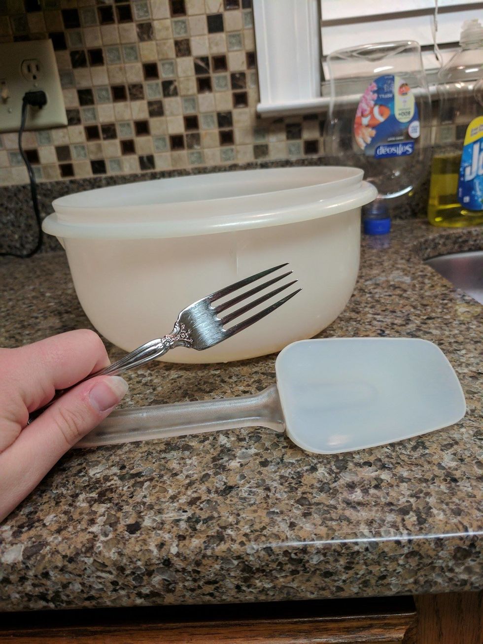 Choose a mixing bowl which can contain at least 12 cups of content, a fork, and a spatula.