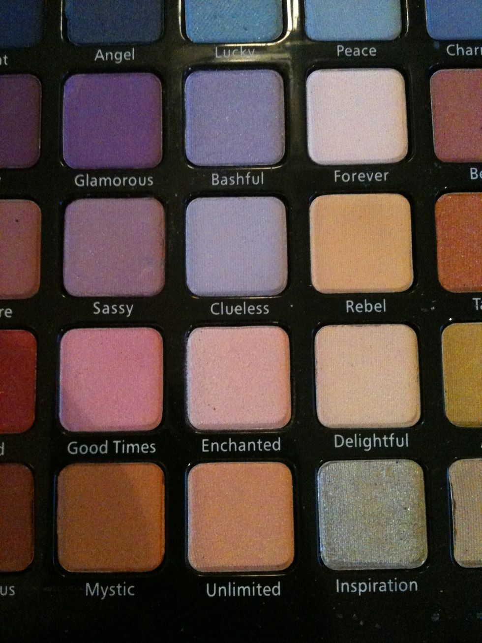 Choose a nude tone for all over your lid. I'm using Enchanted.