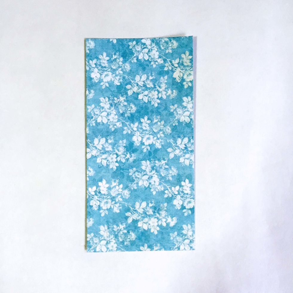 Choose a pattern paper of choice, cut a 2.5" x 5" rectangle.