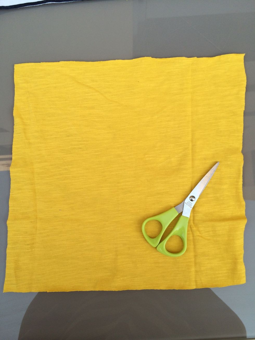 Choose a pice of colorful fabric. I'd like yellow color fabric for my project.