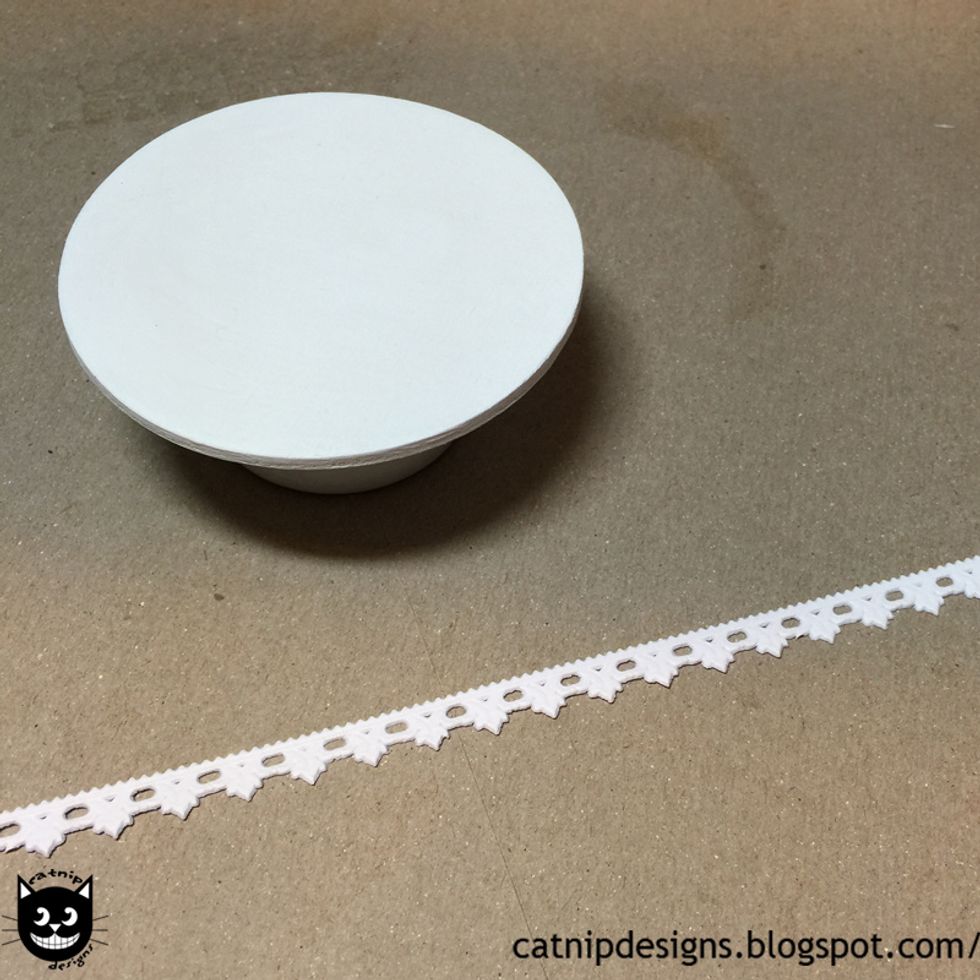 Choose a piece of dresden trim from the pack of White Dresden Border Sampler Set...