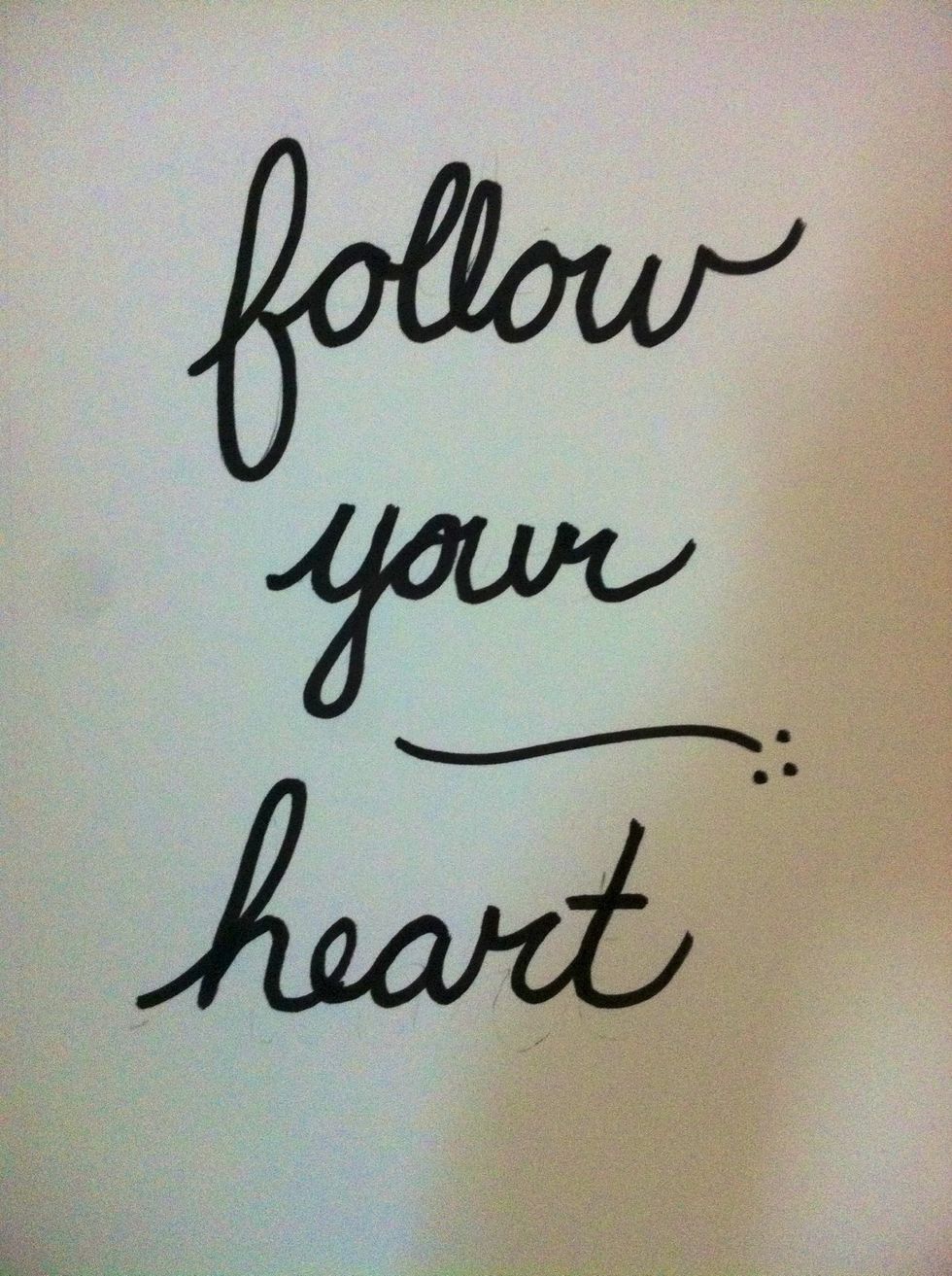 Choose a quote and write it in sharpie. You may want to write it in pencil first. Make sure you use sharpie so that the watercolors don't make it smudge.