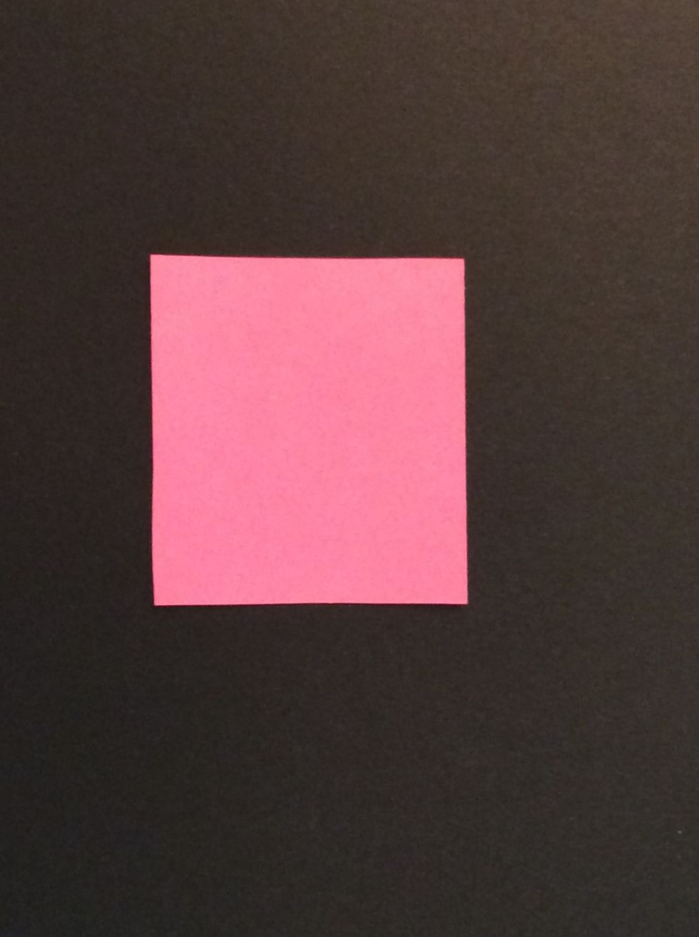 Choose a small colored paper square.